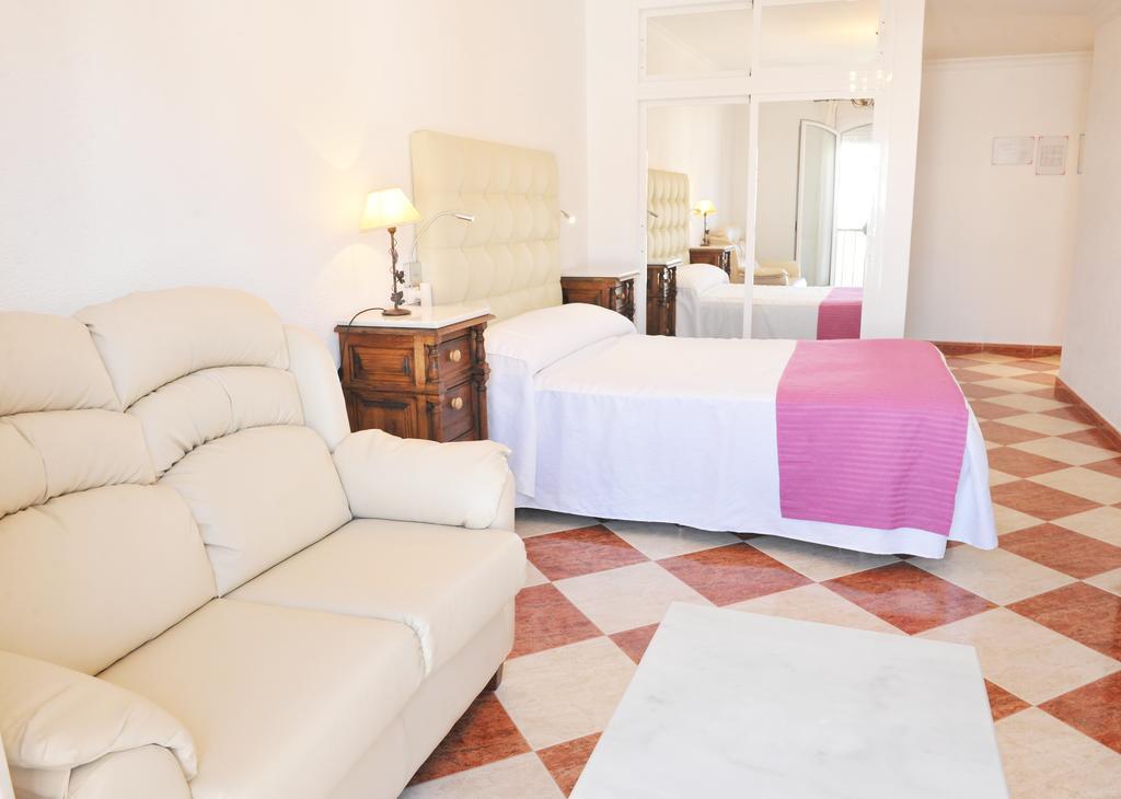 Hostal Puerto Lepe Pokoj fotografie