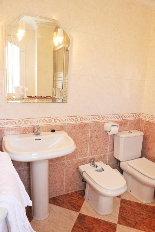 Hostal Puerto Lepe Pokoj fotografie