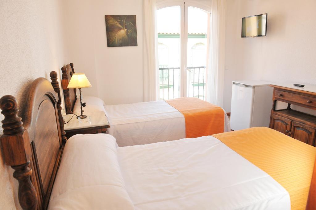 Hostal Puerto Lepe Pokoj fotografie