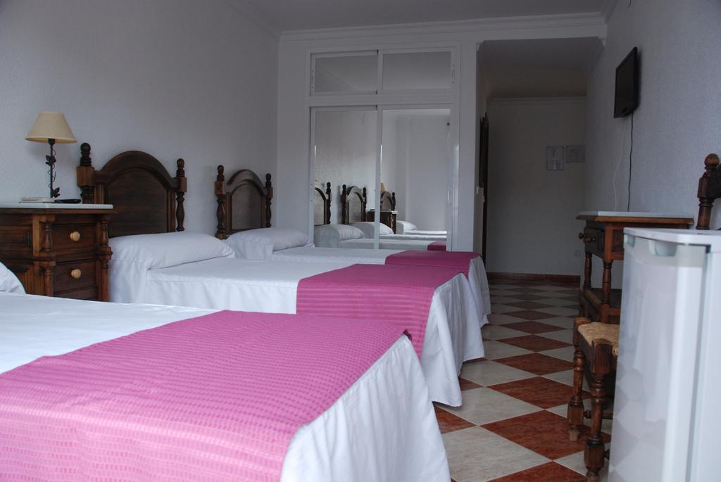 Hostal Puerto Lepe Pokoj fotografie